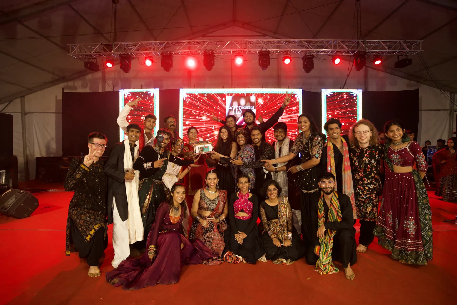 The Dholida team gathered on stage for a group photograph